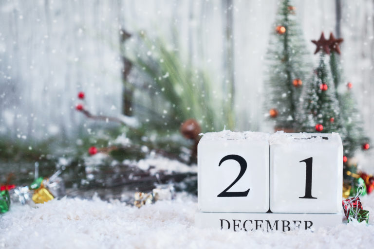 Winter Solstice. White wood calendar blocks with the date December 21st.