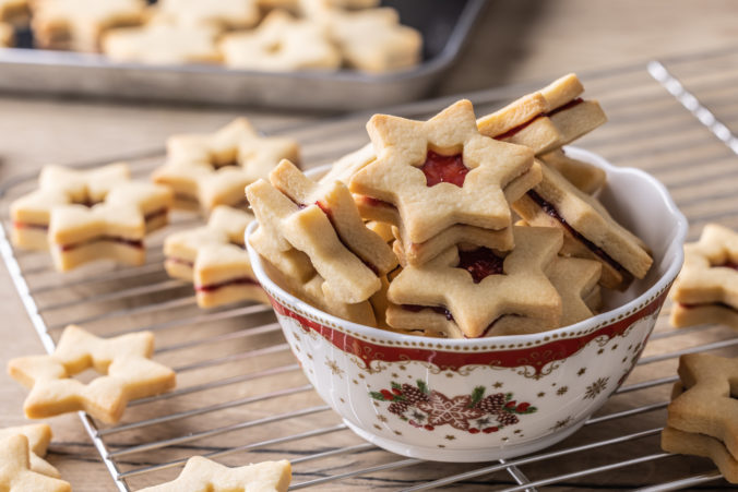 Tea biscuits glued with jam in a Christmas bowl.