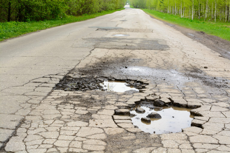 Broken road in the woods