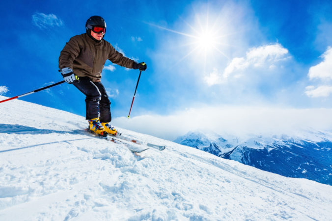 Skier on slope of ski resort