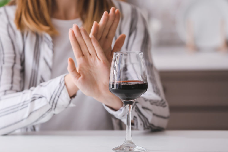 Woman,Refusing,To,Drink,Wine,At,Home.,Concept,Of,Alcoholism
