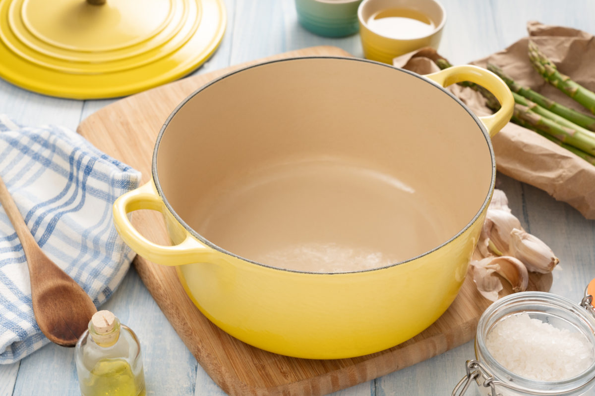 Enameled cast iron pot on a wooden table