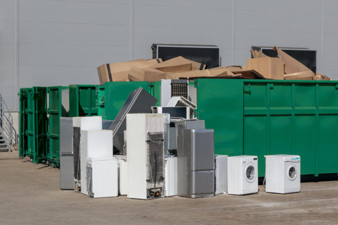 Recycling Center: Piles of Broken Household Electrical Appliances