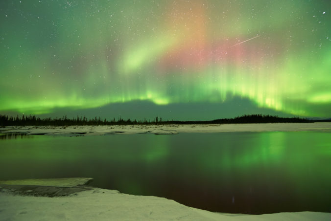 Aurora Borealis over lake