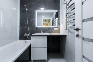 Bathroom,With,Black,Tile,Interior,In,A,Small,Apartment
