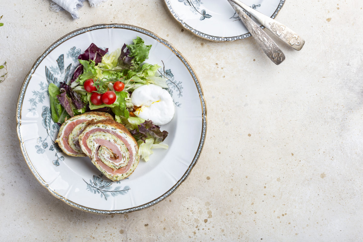 Delicious breakfast with zucchini smoked salmon roulade