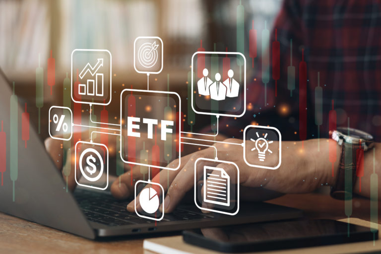 Person working on computer to ETF Exchange traded fund stock market trading investment financial concept..