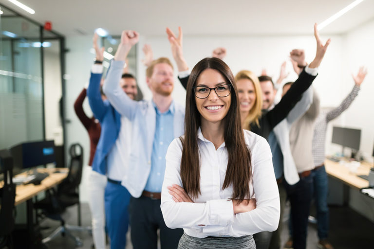 Group of successful business people happy in office