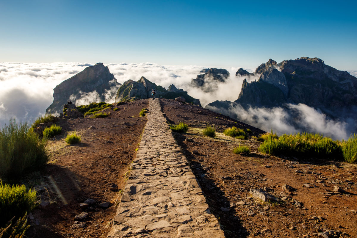 Hiking over Madeira island. The trail around the top mountains on the island - Pico do Arieiro.