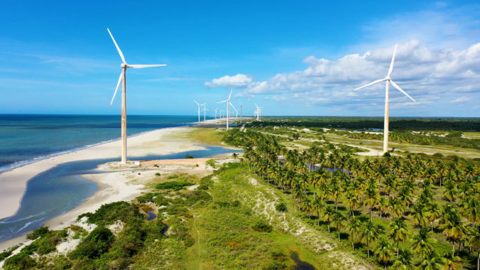 Northeast Brazil. Aeolian turbine at Beach at Ceara state. Wind farm field.