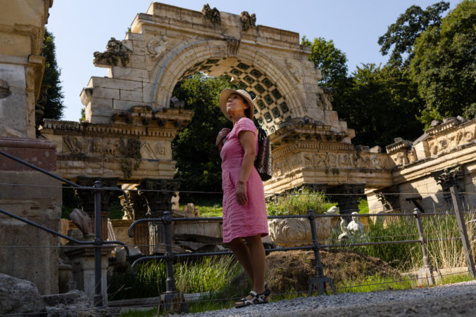 A tourist visits the Roman ruins at Schoenbrunn in Vienna