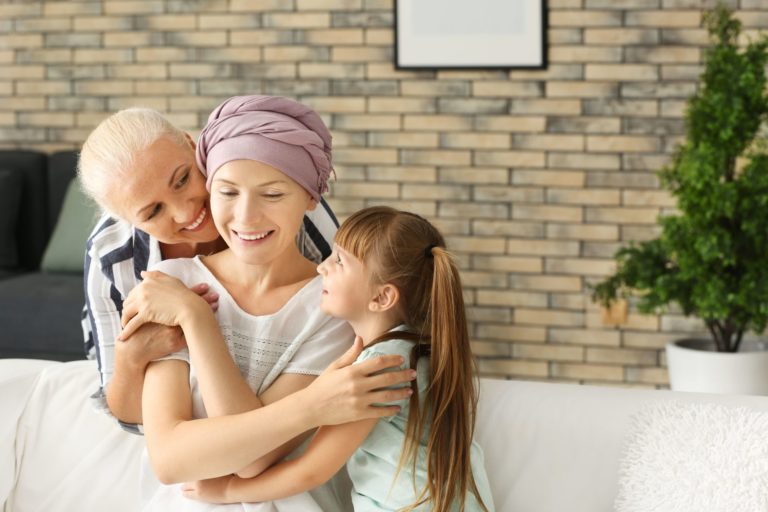 Woman,After,Chemotherapy,With,Her,Family,At,Home