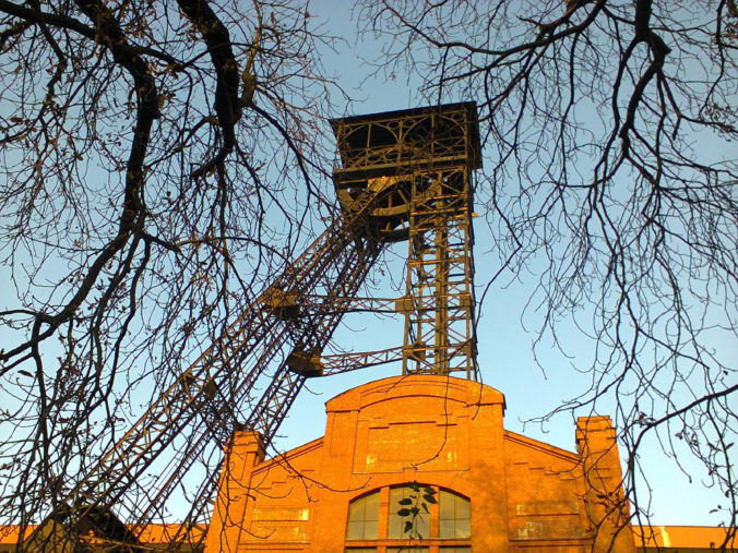 Autumn Twilight Glowing Historic Abandoned Coal Mining Tower with Bare Tree Silhouette 3