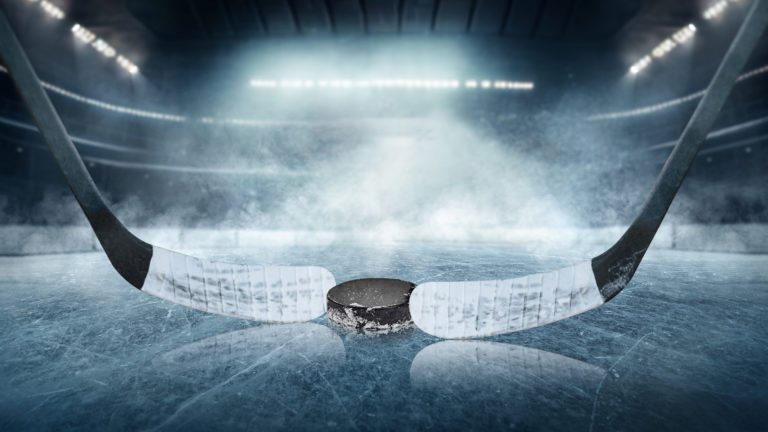 Ice hockey players on the grand ice arena - stadium