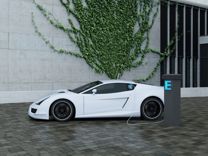 Recharging electric sport car in front of a house