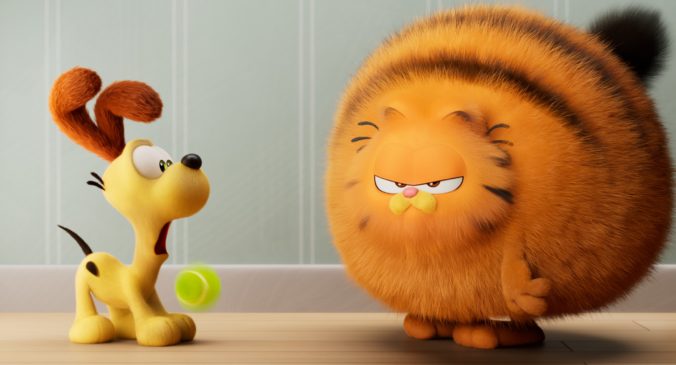 Odie and Garfield (voiced by Chris Pratt) in THE GARFIELD MOVIE.