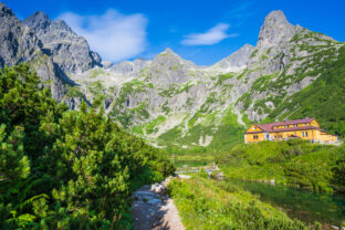 Cottage by the lake in the mountains. Summer day at Chata pri Zelenom plese in High Tatras mountains, Slovakia