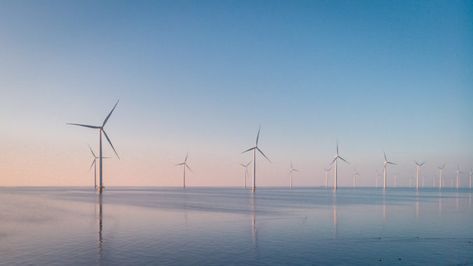 Wind turbine from aerial view, Drone view at windpark westermeerdijk a windmill farm in the lake IJsselmeer the biggest in the Netherlands,Sustainable development, renewable energy