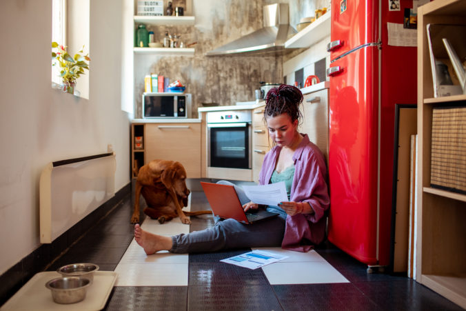 Young adult woman going over her home finances