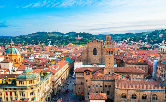 Aerial view of Bologna Cathedral and towers above of the roofs of Old Town in medieval city Bologna