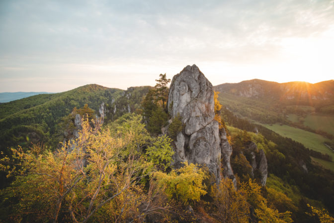 Sunrise at Sulov Rocks in eastern Slovakia. Rough, untouched landscape with rocks in orange light