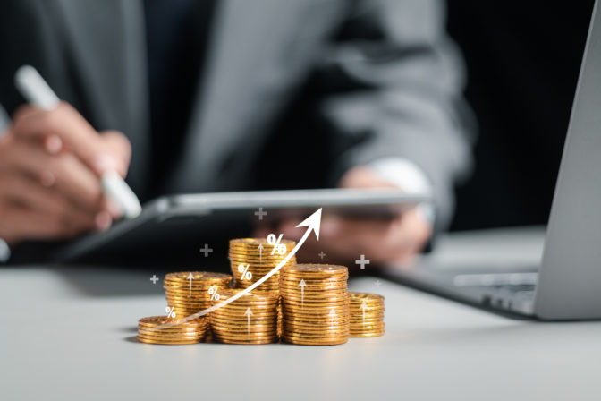 Businessman collecting coins with profit chart analysis business growth, profit growth management and corporate financial statistics. finance and investment concept.