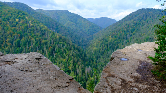 A view of the most beautiful mountains in a panoramic scene. View from Tomasovsky Vyhlad in Slovak Paradise National Park. A blue haze is in the air.