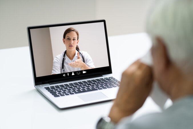 Sneezing Patient Talking With Doctor