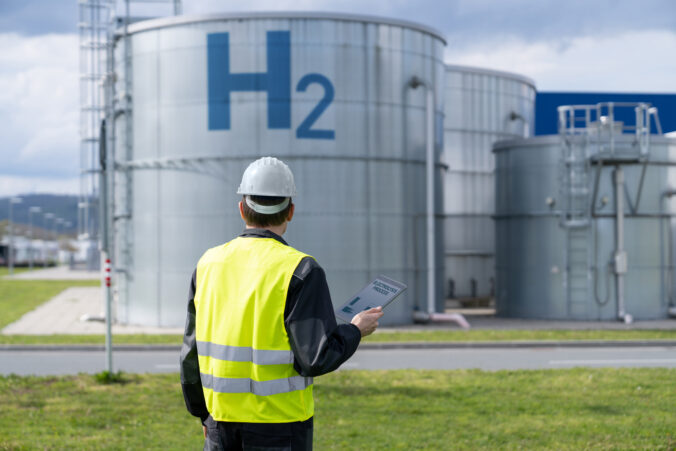 Engineer on a background of Hydrogen factory