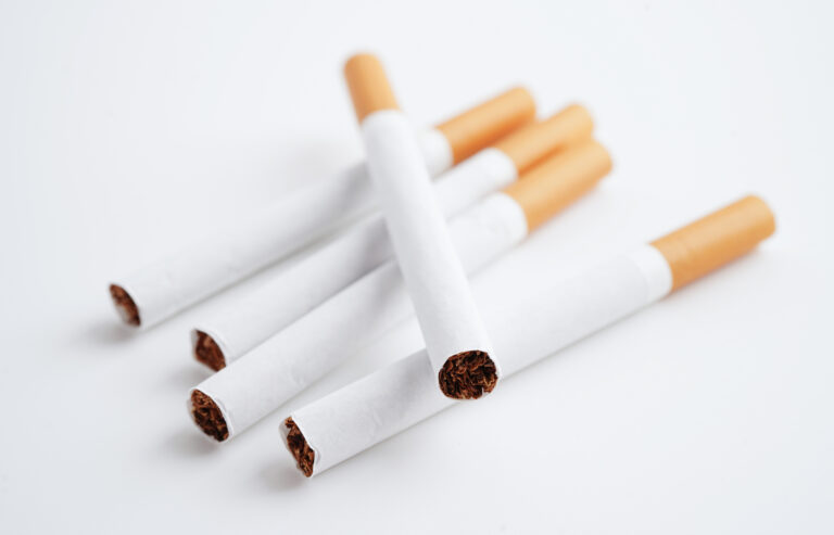 Cigarette, roll tobacco in paper with filter tube, No smoking concept.