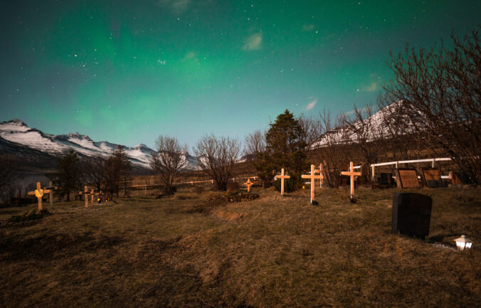 The northern light over the graveyards in East Iceland.