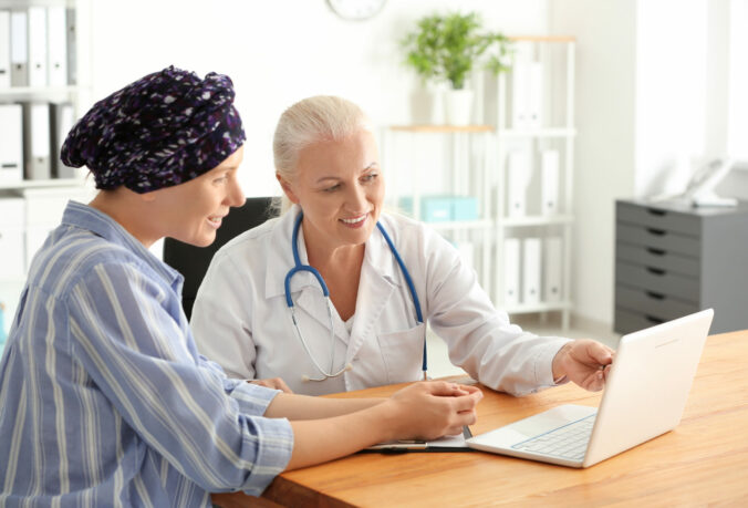 Woman after chemotherapy visiting doctor in hospital