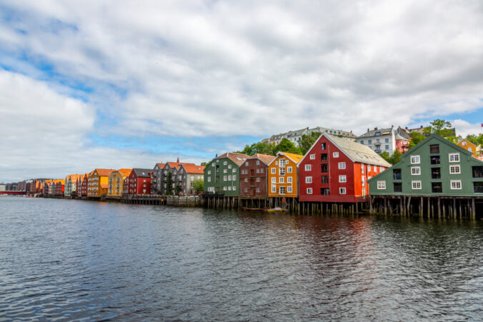 View on colorful pole houses in the Norwegian city of Trondheim in summer