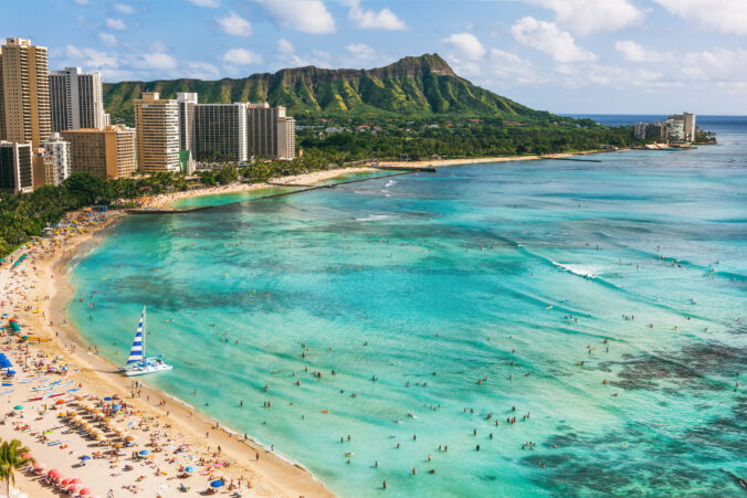 Hawaii beach Honolulu city travel landscape of Waikiki beach and Diamond Head mountain peak at sunset, Oahu island, USA vacation.