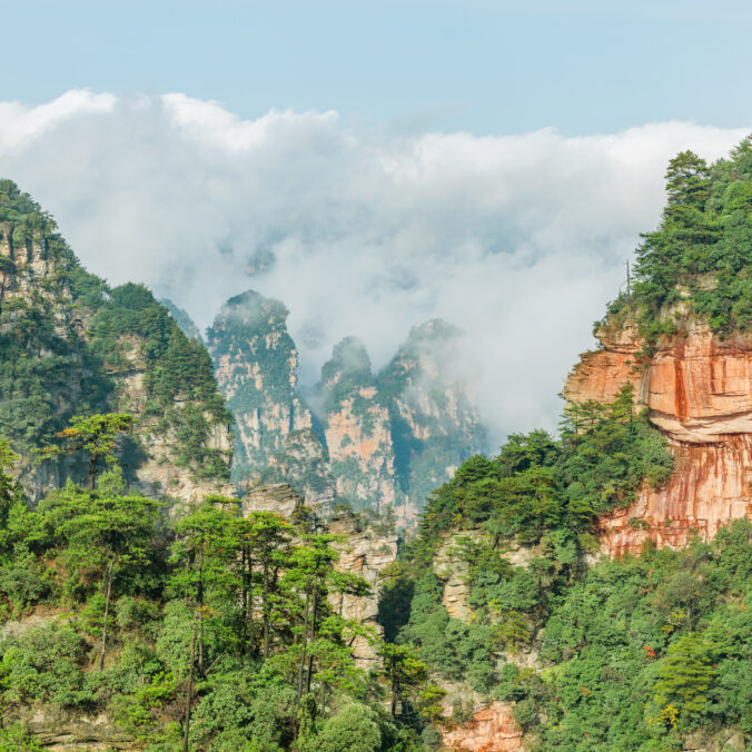 Cliffs in Zhangjiajie Forest Park at autumn sunrise.