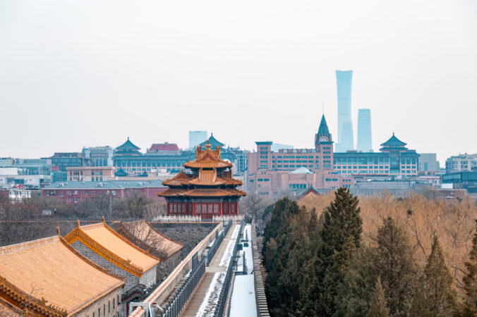 The Corner Tower of Beijing&#039;s Forbidden City and the Modern City Skyline