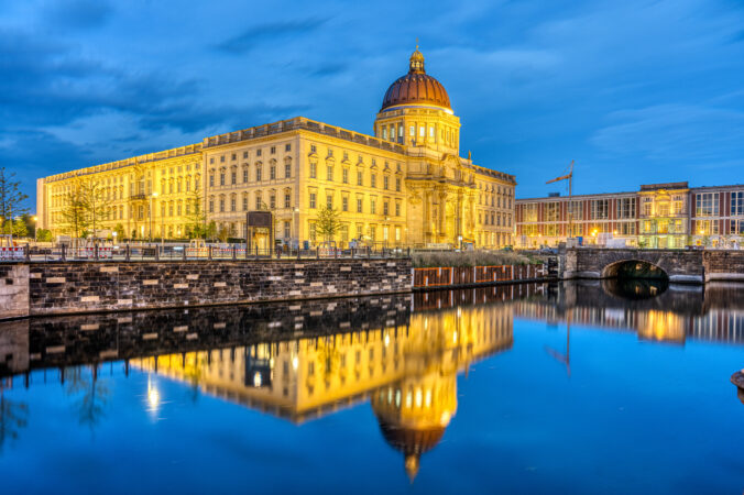 The imposing reconstructed City Palace in Berlin at night