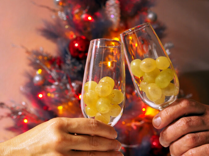 New Year&#039;s Tradition: Twelve Grapes and a Festive Tree