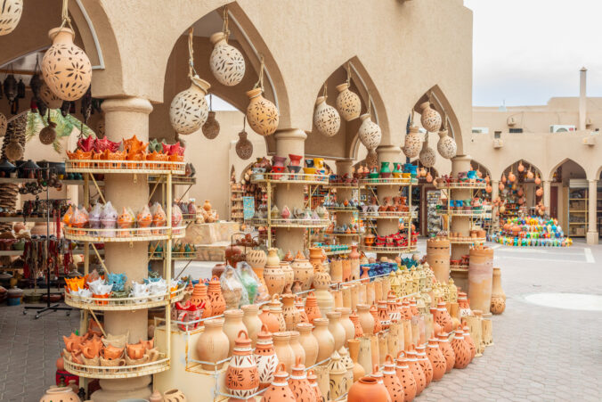 Handmade souvenirs and ceramic pottery jugs trade market in bazaar of Nizwa, Sultanate Oman