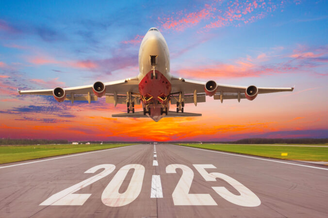 Inscription on the runway 2025 surface of the airport road with take off big airplane enjoy travel sunset sunrise dawn. Concept of travel in the new year, holidays.