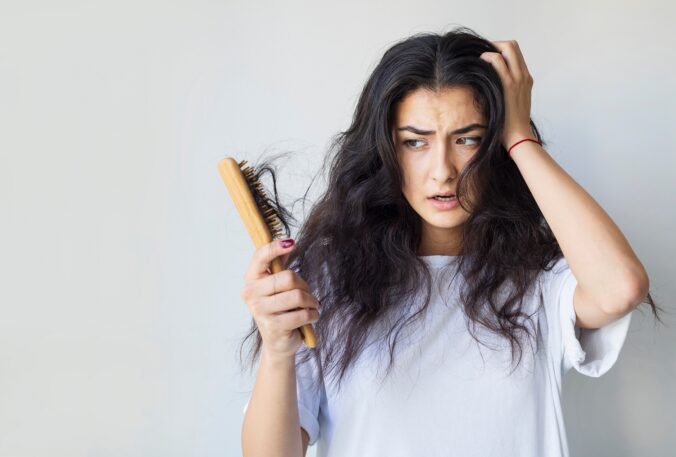 Woman have damaged and broken hair, loss hair, dry problem concept.