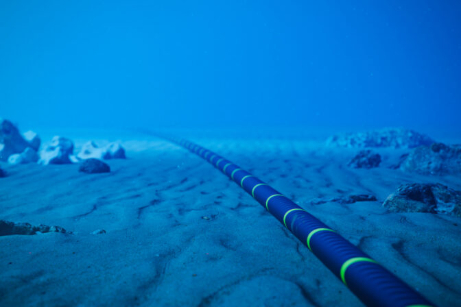 Underwater Fiber Optic Cable On Ocean Floor