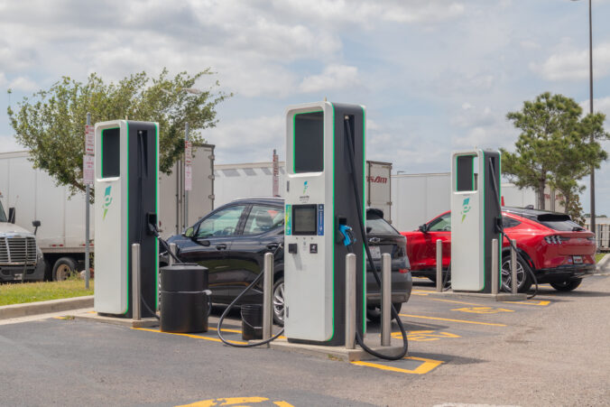 Electrify America electric vehicle charging station with multiple chargers in use