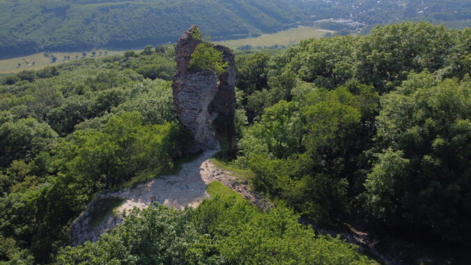 Beautiful view of the wall of ancient Pajstun Castle surrounded by Beautiful Carpathian forest