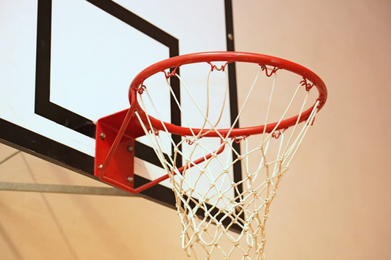 Basketball hoop in a sportshall.