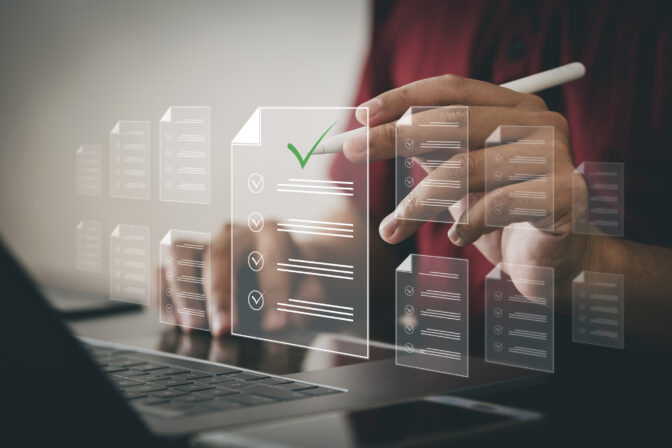 One person is using a computer. Digital document management concept on virtual screen Automatic document allocation process Paperless document management Integrating and sharing data in the cloud