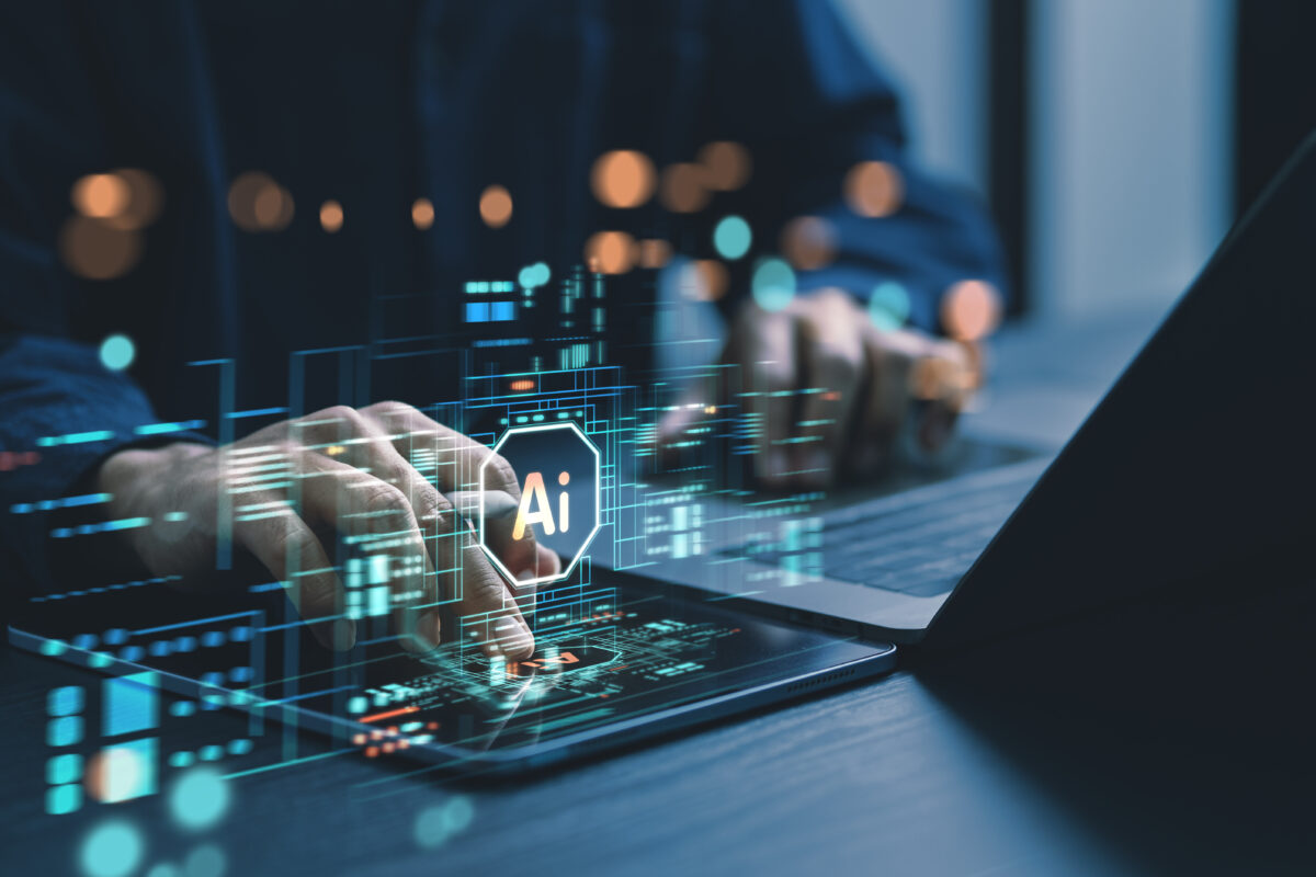 Humans are using laptops and computers to interact with AI, helping them create, code, train AI, or analyze big data with fast, cutting edge technology.