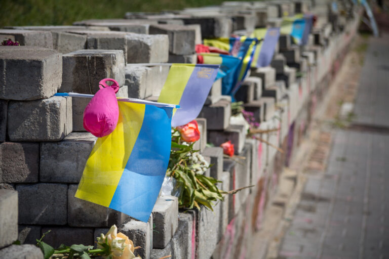Memorial erected to the people killed by snipers on Heroyiv Nebesnoyi Sotni street during the Euromaidan revolution and protests on Maidan Square - Independence Square with a ukrainian flag on it
