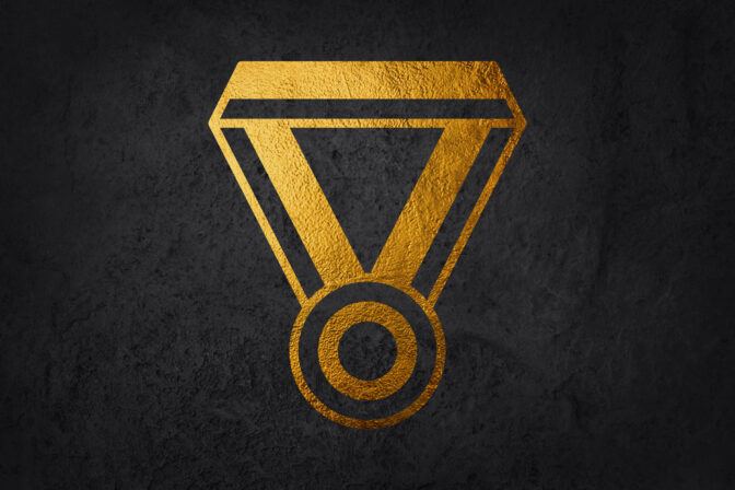 Golden blank medals hanging on red ribbons isolated on white background. Vector sports illustration
