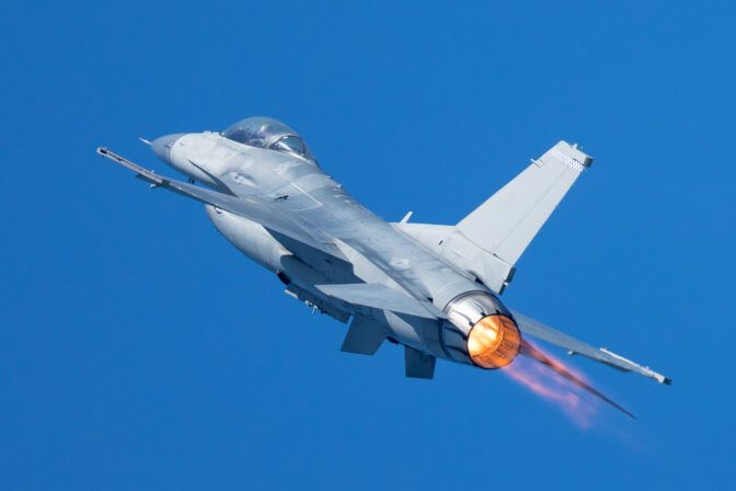 F 16 Fighting Falcon flying away, with afterburner on